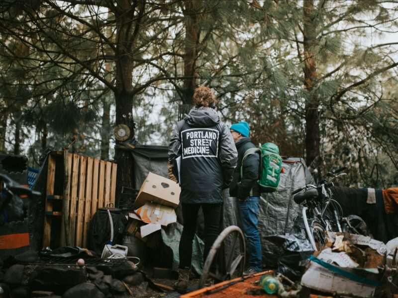 Volunteers in homeless camp